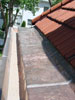 custom copper gutters and tile roof