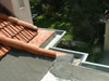 custom copper gutters and tile roof