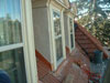 custom copper gutters and tile roof